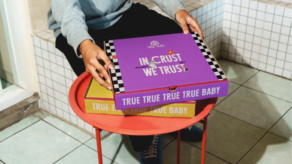 True Slice pizza box packaging, In Crust We Trust